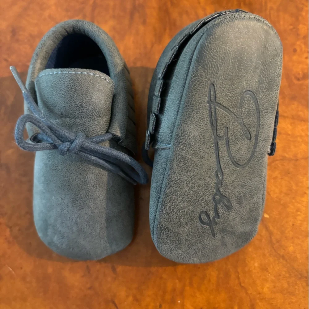 Baby Blue Moccasins, size 12-18 months. Never worn.